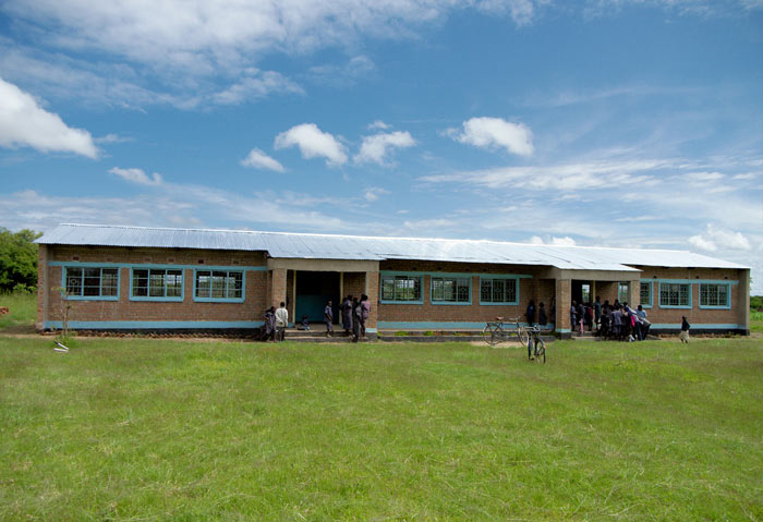 We we’re absolutely delighted when George told us that CARE had agreed to fund a 3-classroom block. The community built the block themselves..