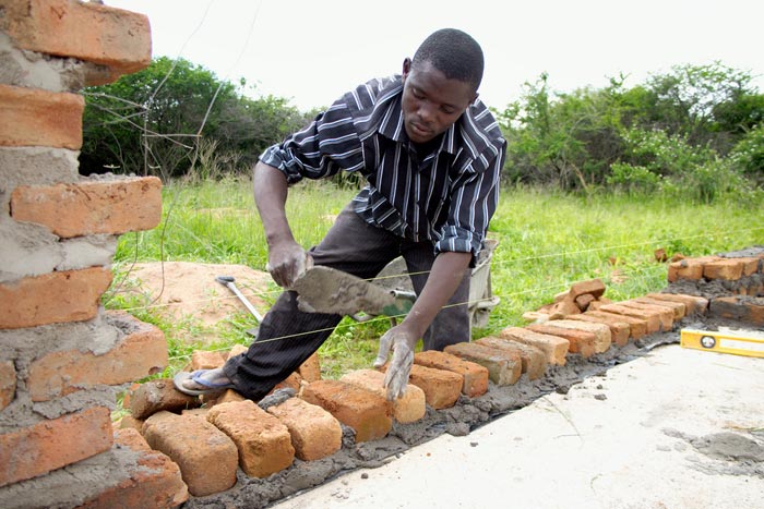 Then the brick laying began.